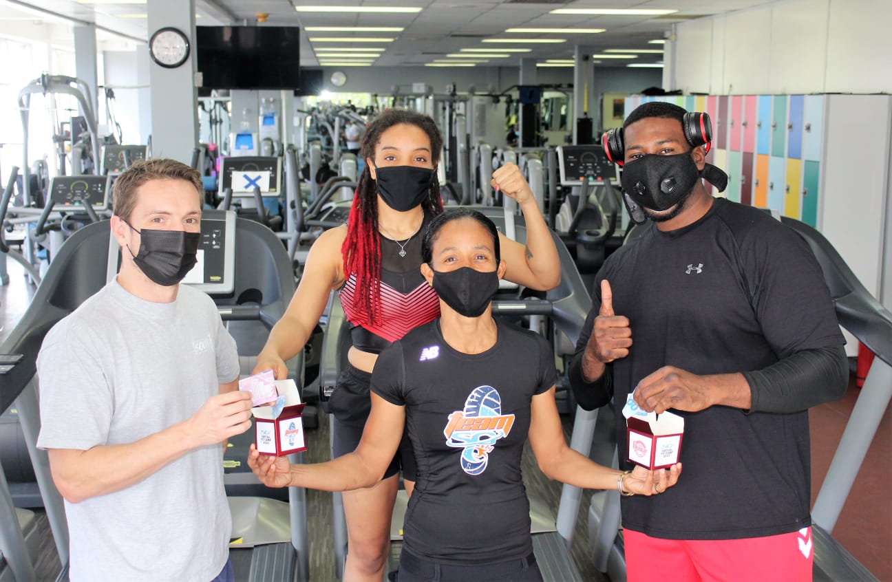 FITNESS WITH A PURPOSE: From left, Ben Hughes (boxing/strength and conditioning coach), boxers Tianna Guy and Nigel Paul and fitness trainer Simone Gonzales, centre, as she launched her donation drive 2022 for the TTOC Athlete Welfare and Preparation Fund.