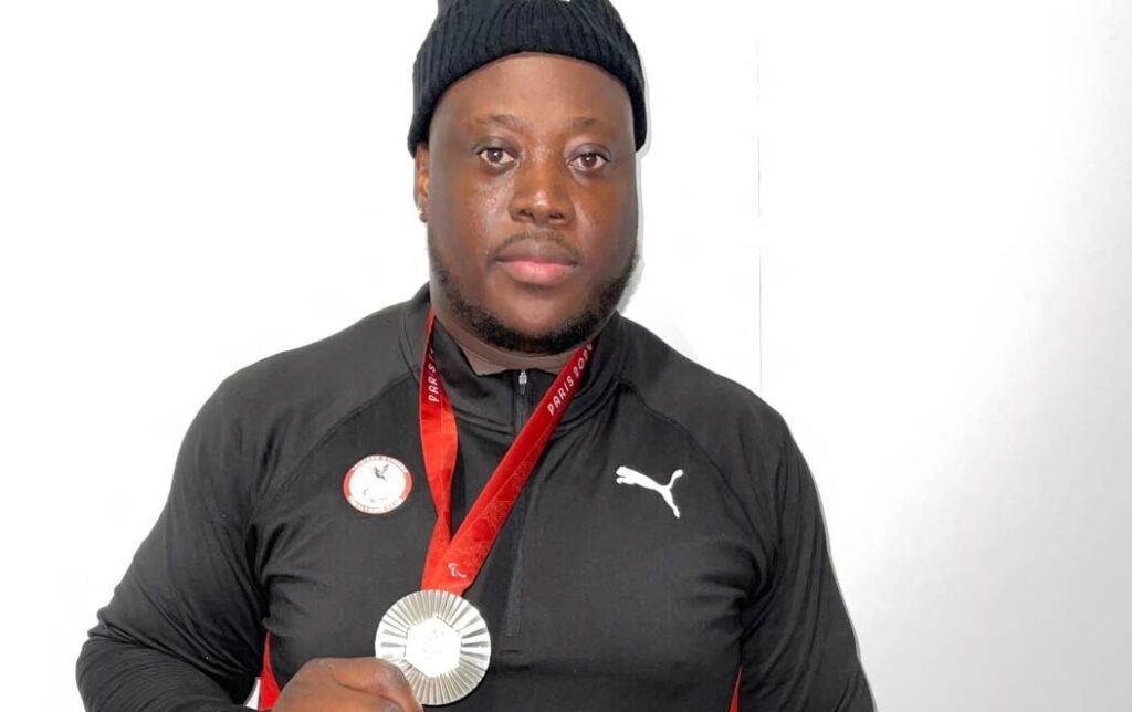 Trinidad and Tobago's Akeem Stewart displays his Paralympic Games men's discus F64 silver medal at the Stade de France on September 5. - Photo courtesy TT Paralympic Committee (Image obtained at newsday.co.tt)