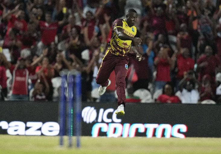 CELEBRATION TIME: West Indies’ captain Rovman Powell celebrates after taking a catch to dismiss New Zealand’s Glenn Phillips during the men’s T20 World Cup match at the Brian Lara Cricket Academy, Tarouba, on Wednesday, June 12. —Photo: AP (Image obtained at trinidadexpress.com)
