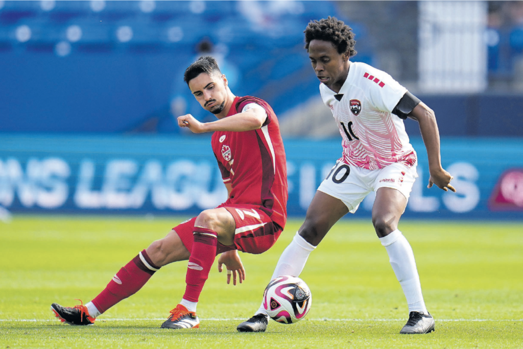 Canada midfielder Stephen Eustaquio, left, and TT midfielder Real Gill, right, compete for the control of the ball in the second half of a Concacaf Nations League Play-In match, on March 23, in Frisco, Texas. - AP PHOTO (Image obtained at newsday.co.tt)